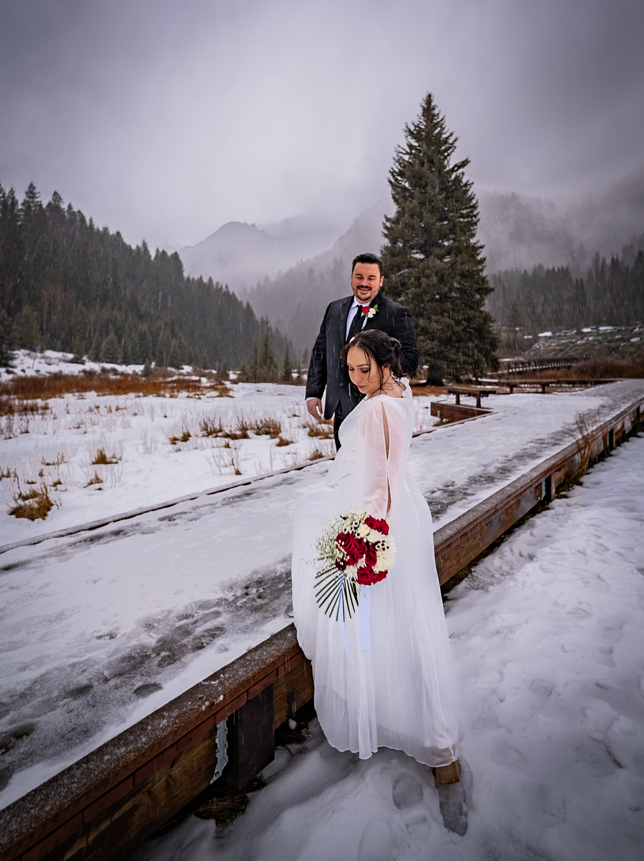 Couple walking together in an outdoor elopement setting